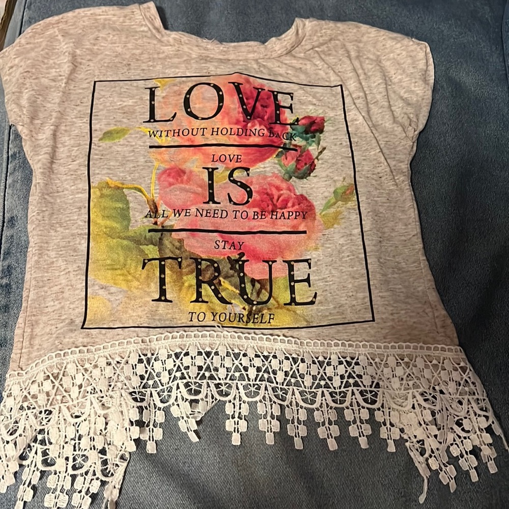 Shirt with quote on the front and flowers